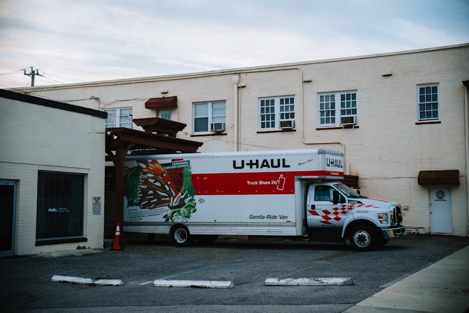 Moving truck outside a residential home